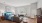 Furnished studio with seating and bedroom set