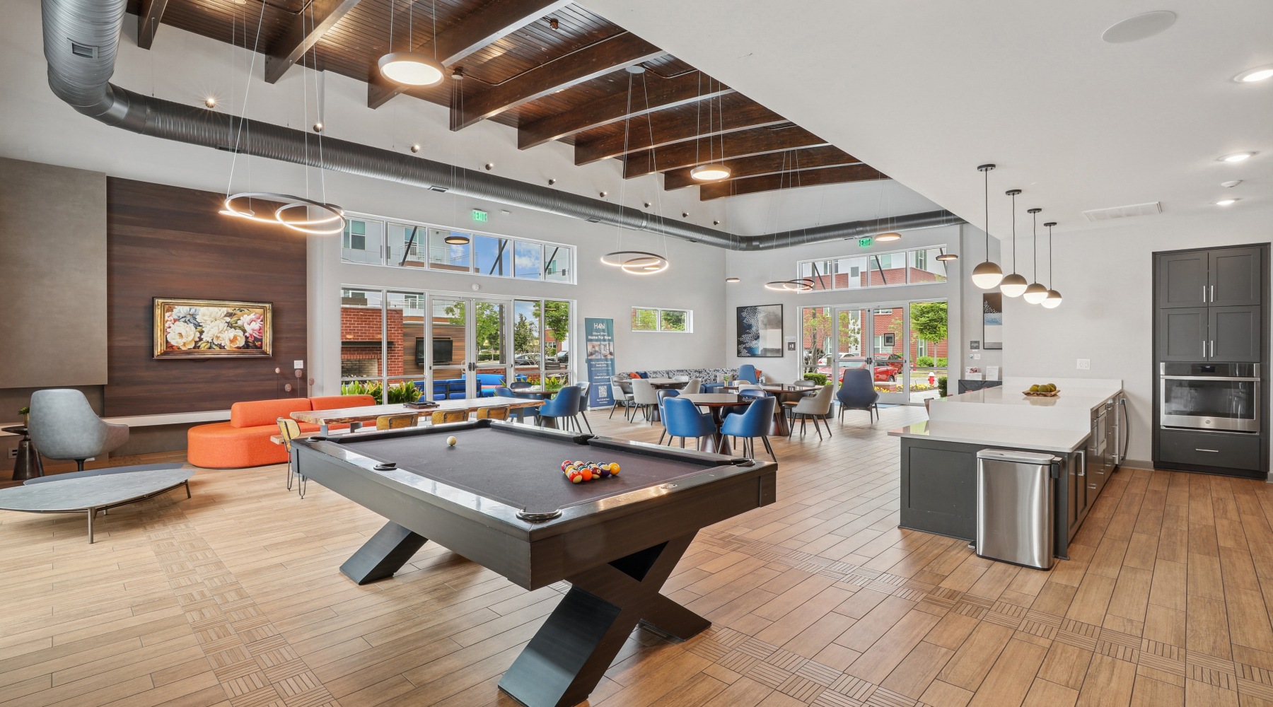 clubroom with coffee bar, pool table, and lounge seating